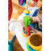 BABY EINSTEIN Skákadlo/aktivní centrum 2v1 Neighborhood Symphony 6m+ do 11 kg
