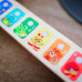 BABY EINSTEIN Hračka dřevěná hudební kytara Together in Tune Guitar™ Connected Magic Touch™ HAPE 6m+
