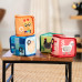BABY EINSTEIN Hračka textilní kostky abeceda Alpha Stacks™ 4ks, 3m+