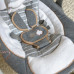 INGENUITY Houpačka konvertibilní cestovní s melodií Bella Teddy™ 0m+ do 9kg