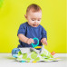 BRIGHT STARTS Mazlící dečka na C kroužku Little Taggies zelené tečky 0 m+