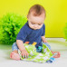 BRIGHT STARTS Mazlící dečka na C kroužku Little Taggies zelené tečky 0 m+