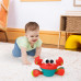 BRIGHT STARTS Hračka hudební a multisenzorická Rockin' Crawling Crab™ - Red, 6m+ BRIGHT STARTS Hračka hudební a multisenzorická Rockin' Crawling Crab™ - Red, 6m+
