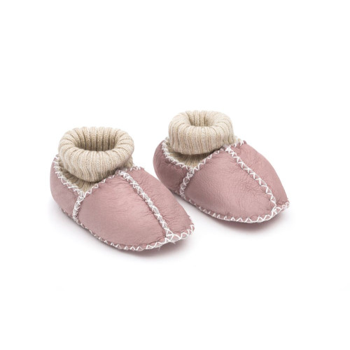 Fillikid Dětské capáčky z jehněčí kožešiny Pink vel. 19/20 Fillikid Dětské capáčky z jehněčí kožešiny Pink vel. 19/20