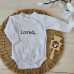 Luxusní kojenecké celorozepínací body s dlouhým rukávem LOVED  ZYZIO Z&Z Bílé